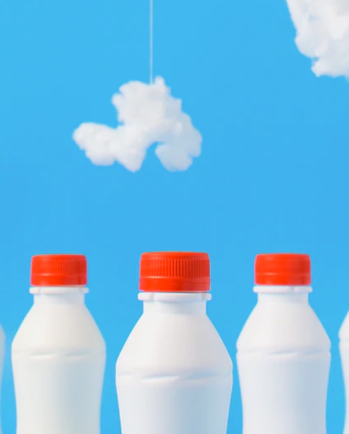 Milkbottles with sky background