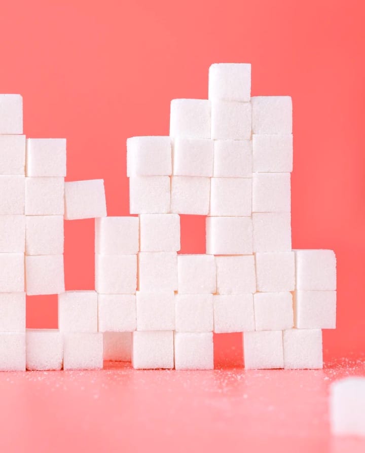 Sugar cubes with red background